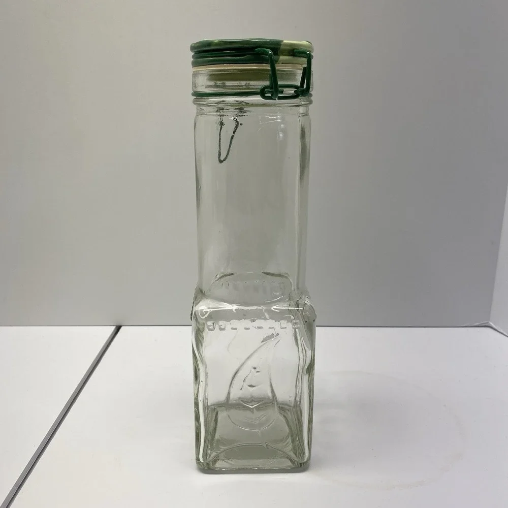 Vintage Glass Square & Round With Wire Bail @Clamp Bottle w/ Green‎ Leaf Cap
